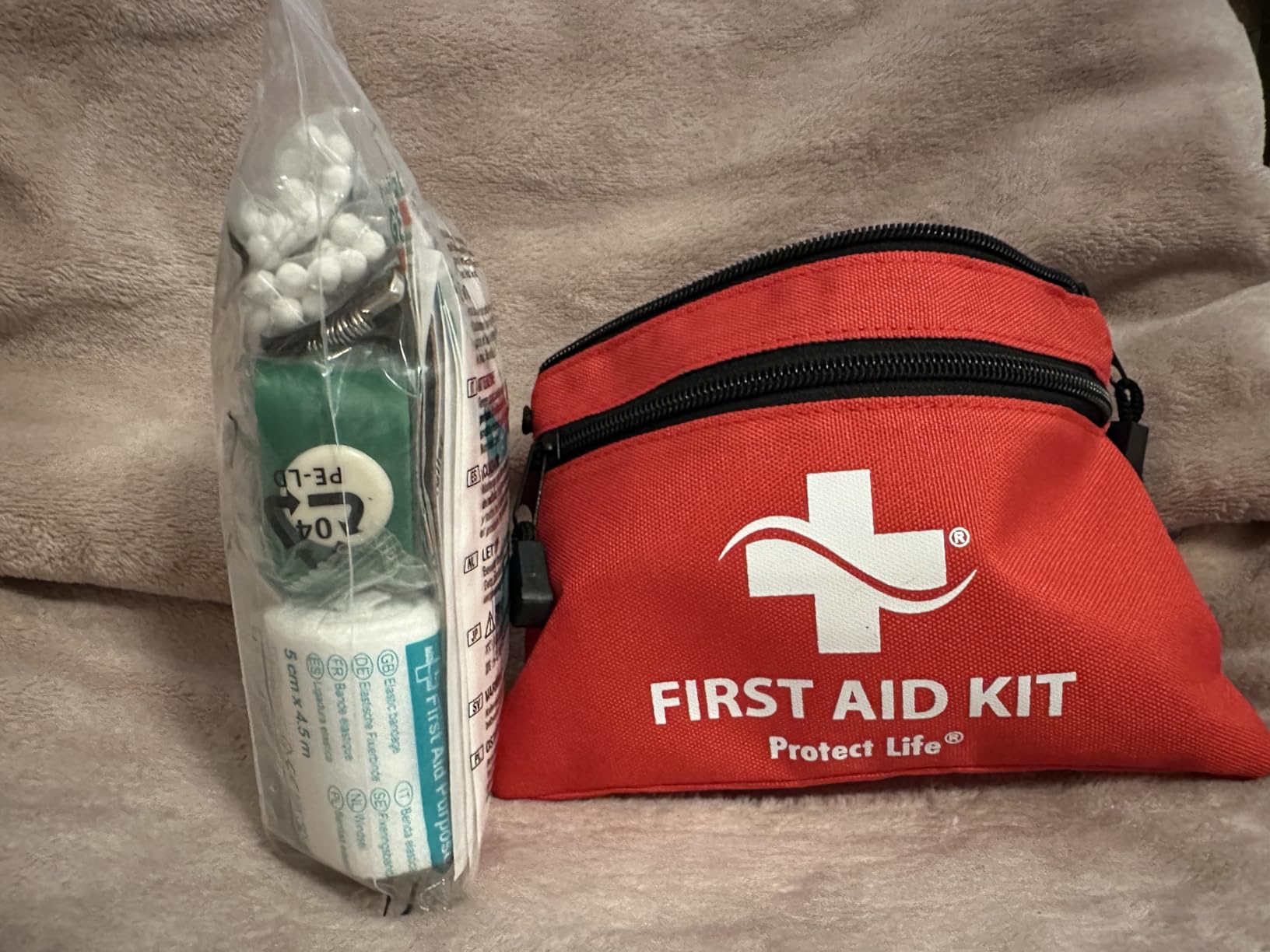 Protect Life Travel First Aid Kit for Car - Small Mini Emergency Kit, 100 Piece Waterproof First Aid Kit for Home, Camping, Boat & Hiking - Includes Emergency Blanket & First Aid Guide customer photo 1
